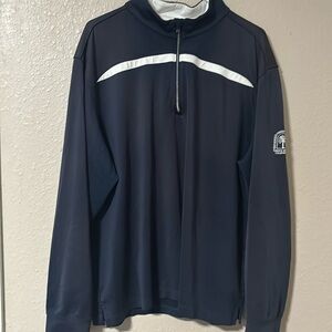 Greg Norman quarter zip pull over. Navy blue with white stripe